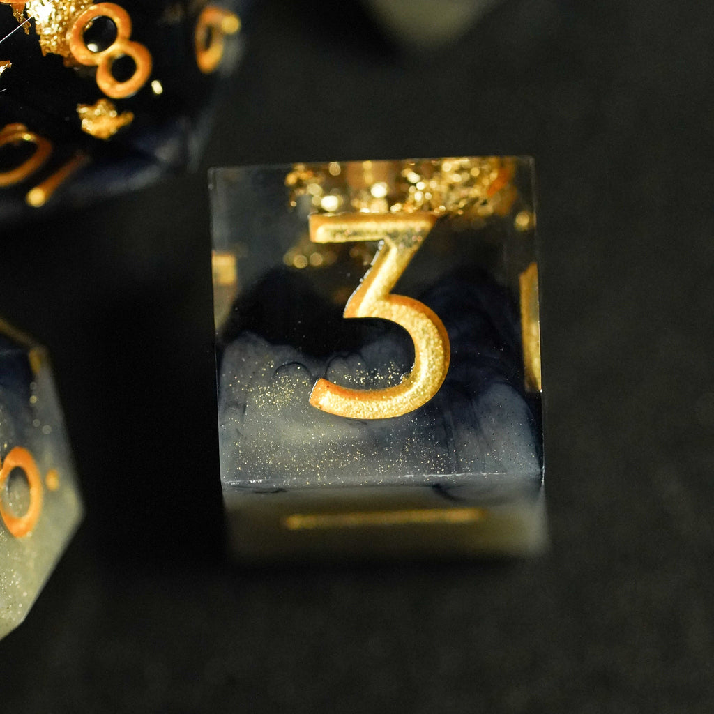 Close-up of a transparent block with a gold number '3' on a dark background