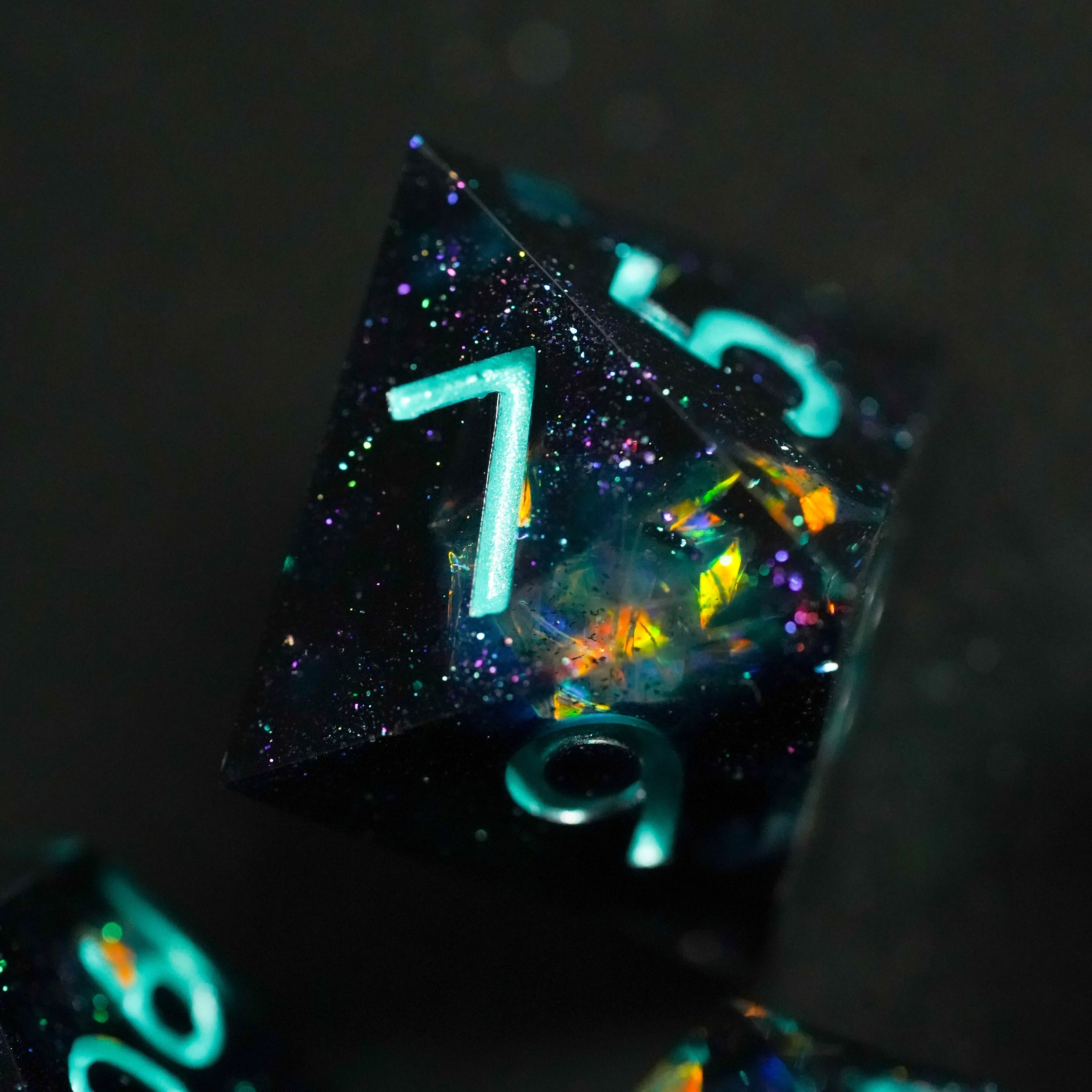 Glowing polyhedral dice with numbers on a dark background