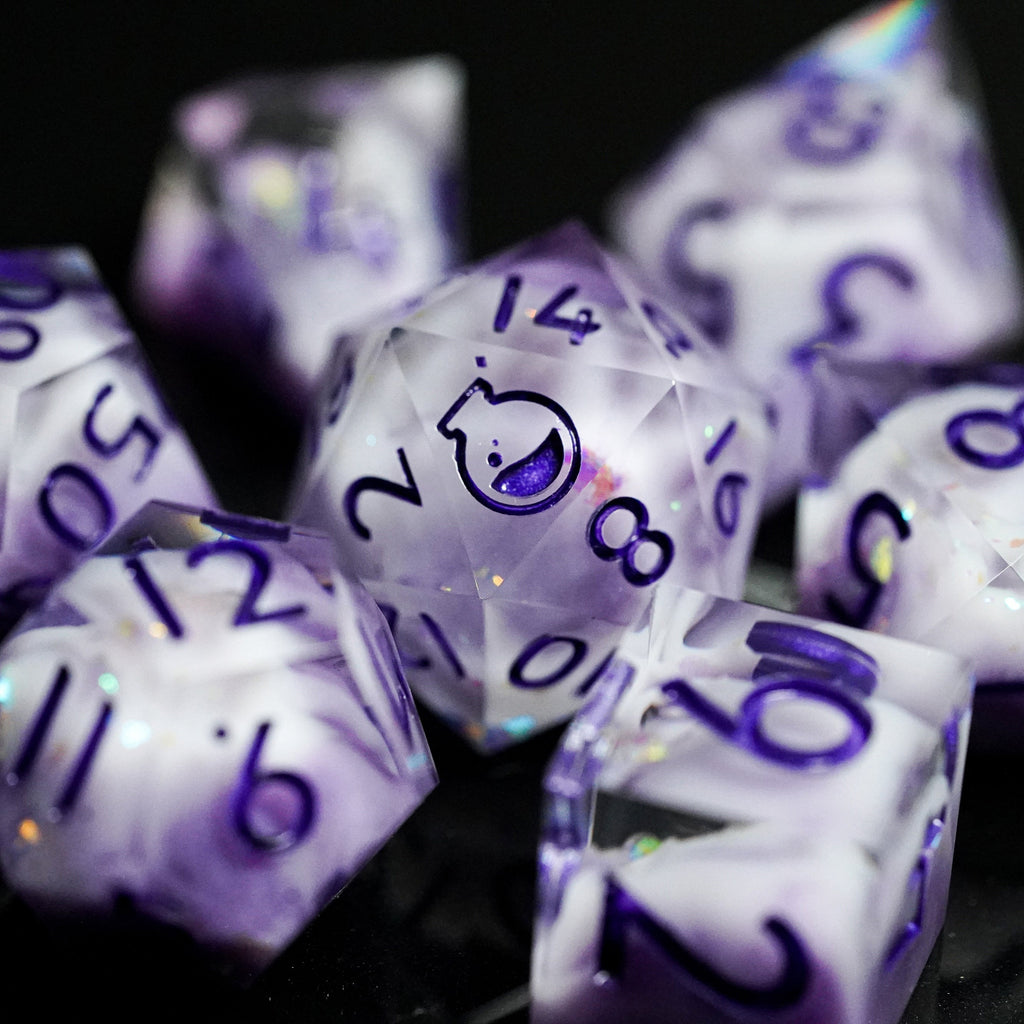 Purple polyhedral dice set with white numbers on a dark background