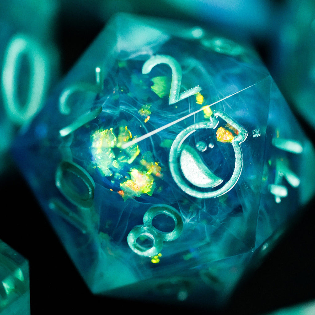 Close-up of a transparent dice with glowing numbers on a dark background
